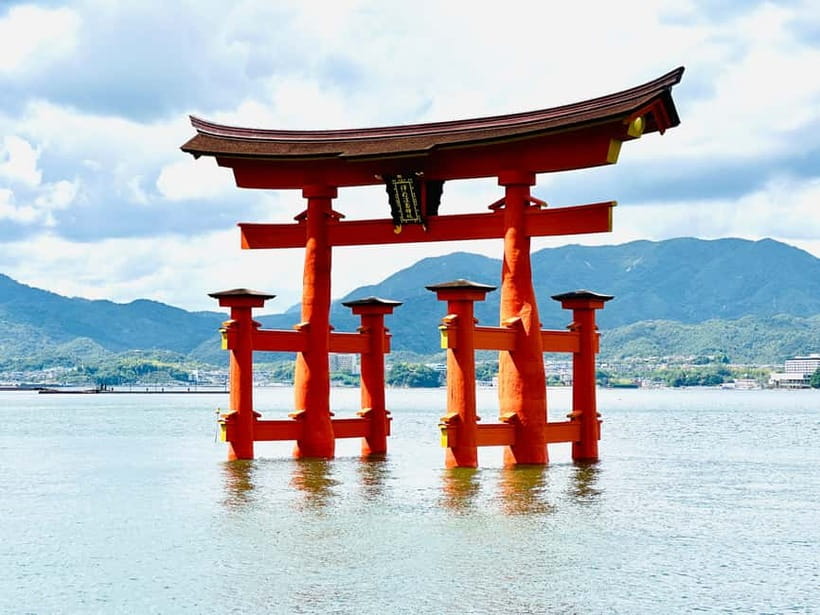 From Tokyo: Hiroshima and Miyajima Day Trip by Bullet Train - Arriving in Hiroshima and heading toward Miyajima