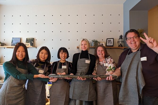 Giant Sushi Cooking Class: Make a 1.5m Sushi Roll in Tokyo - Japanese snacks, conversation, and social games