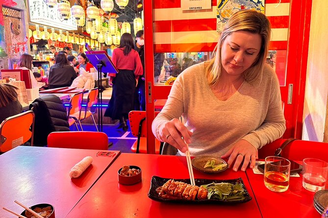 Hidden Bites of Shinjuku A Foodie Walk Tour With A Local Expert - Godzilla Road and Head: the final big photo stop