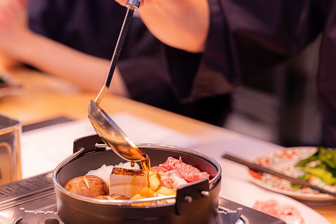 Japanese Sake Tasting & Wagyu Sukiyaki Cooking Class in Tokyo - A vegetable-carving demonstration adds a visual pause