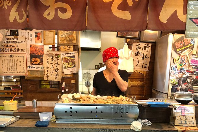 Private Tokyo Food Tour - Retro Akabane Izakaya Experience - Third stop: seafood, grilling, and local company
