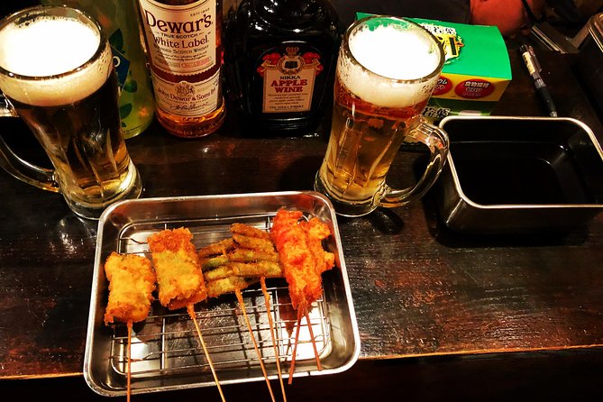 Sangenjaya Back Alleys Private Food and Drink Tour - Stop one: cooking okonomiyaki and monjayaki