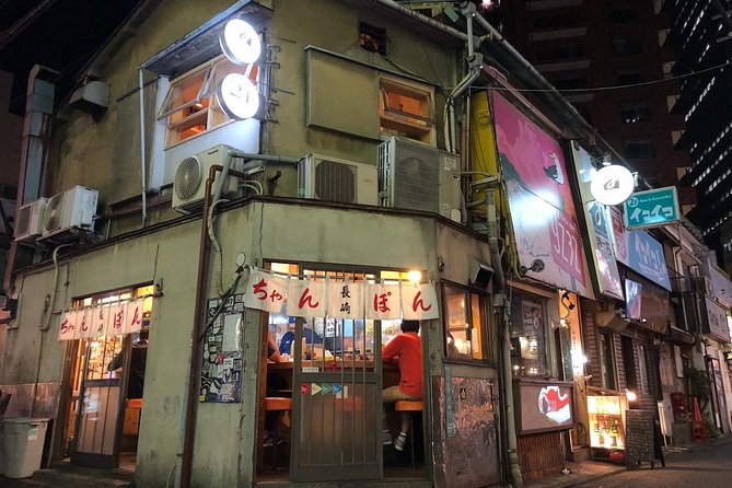 Sangenjaya Back Alleys Private Food and Drink Tour - Stop three: seafood and sake in a small izakaya
