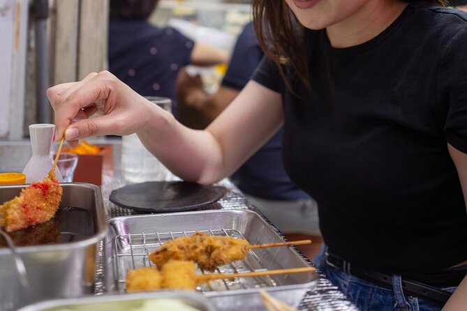 Shibuya by night in Small Groups: Neon Lights and Local Flavors - MEGA Don Quijote in ten minutes