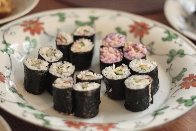 Small Group Sushi roll and Tempura Cooking Class in Nakano - Sitting down for a Japanese-style meal