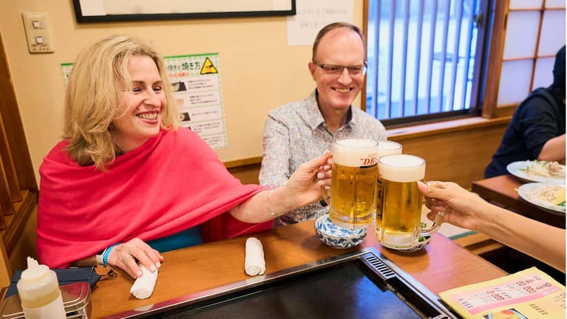 Tokyo: Asakusa Guided Food Tour with 12 Dishes & 3 Drinks - Izakaya dining and three drinks