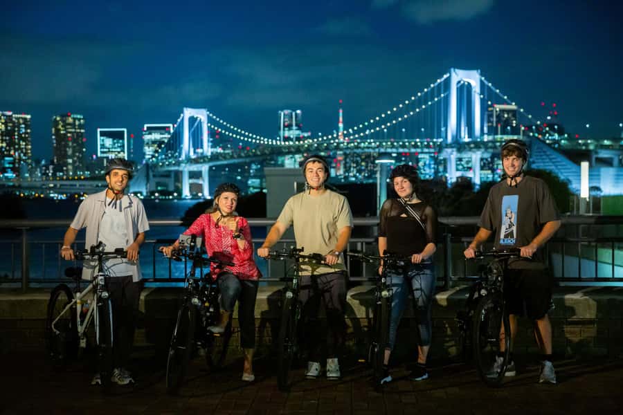 Tokyo Bay Area: Sunset Night View 3h E-bike Guided Bike Tour - From fish market streets to the quieter side of Tokyo