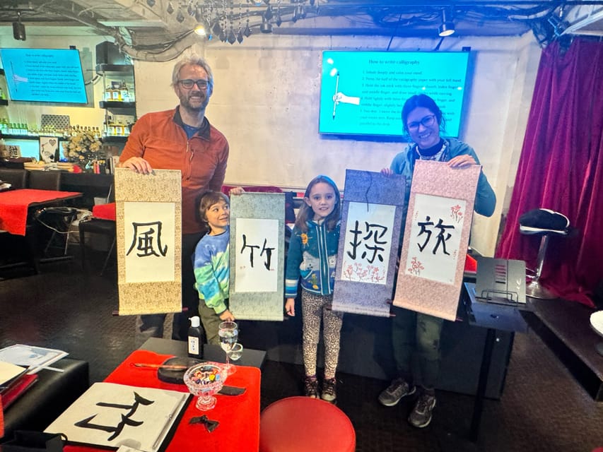 Tokyo: Calligraphy on Kanji Fan & Scroll with Drink - Making the fan and hanging scroll