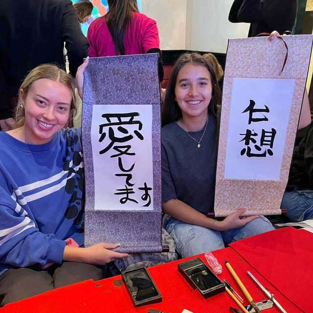 Tokyo: Calligraphy on Kanji Fan & Scroll with Drink - The personalized hanko stamp and extra souvenirs