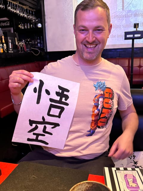 Tokyo: Calligraphy on Kanji Fan & Scroll with Drink - Why the drink and quiet setting matter