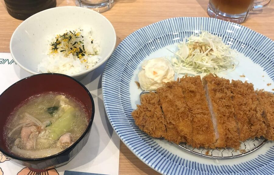Tokyo: Challenge Sumo Wrestlers and Enjoy Meal - Putting on the sumo costume