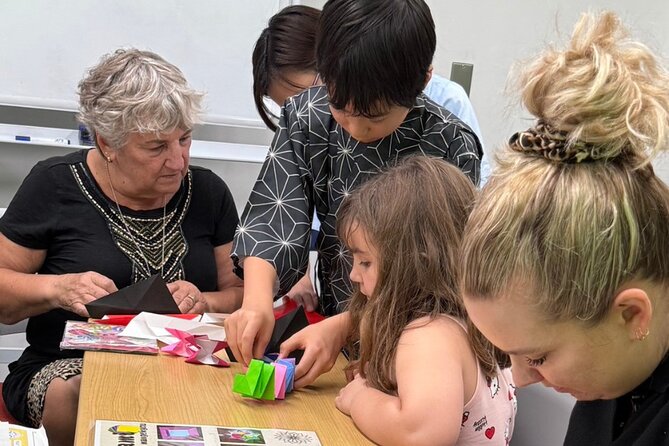 Tokyo Family Culture Workshop: Calligraphy, Origami &Yukata Photo - Calligraphy on a shikishi board: choose a word that matters