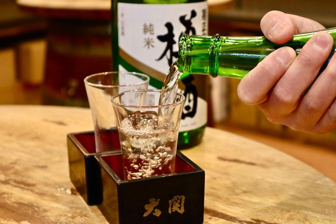 Tokyo: Food Tour in Ueno with 10+ Tastings of Japanese Classics - Eating beneath the elevated train tracks