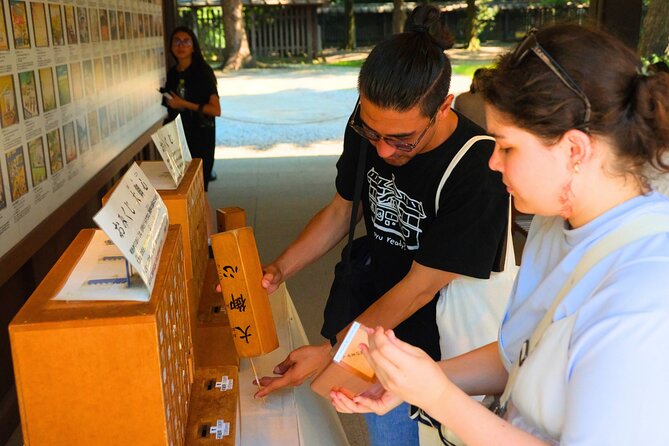 Tokyo Meiji Shrine & Harajuku: Walk Through Japanese Culture - Purification, prayer, and omikuji