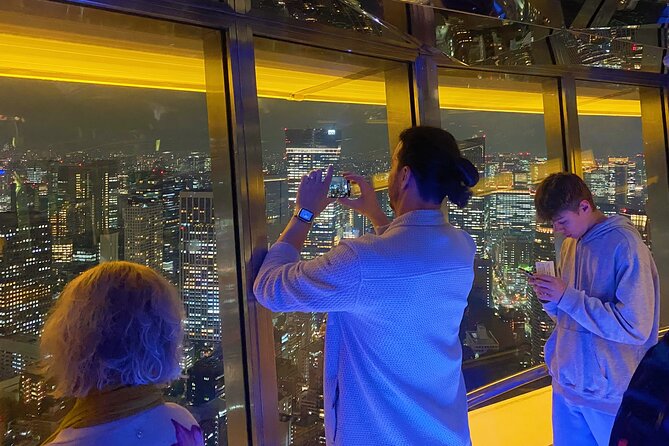 Tokyo Night E-Bike Tour with Tokyo Tower and Dolphin Show - Sengaku-ji Temple and a small slice of Minato