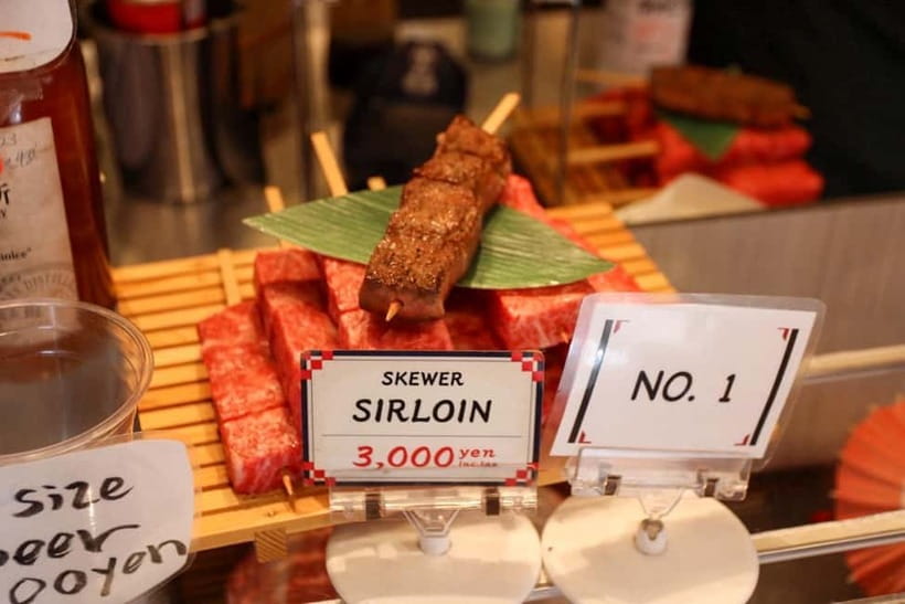 Tokyo: Private Tsukiji Street Food & Sake with Local Guide - Tea, beans, peanuts, and the taste of dashi