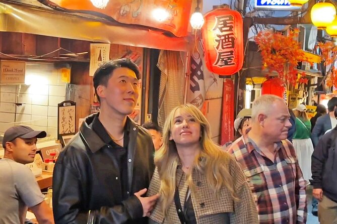 Tokyo: Shinjuku Bar Hopping & Night Walking Tour - Kabukicho, neon signs, and the city after dark