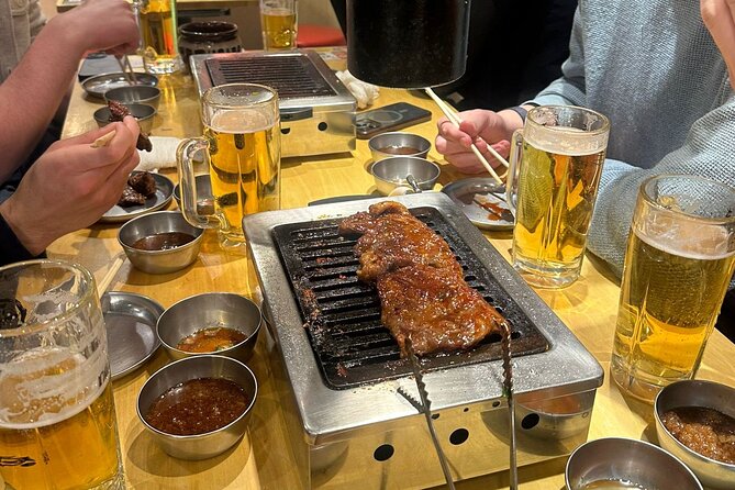 Tokyo: Shinjuku Bar Hopping & Night Walking Tour - Golden Gai, tiny bars, and the final stop