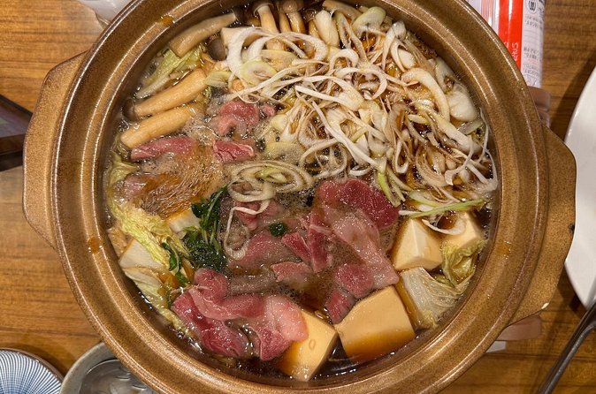 Tokyo Shinjuku Bar Hopping –Wagyu , Ramen & 7 Dishes - Japanese games and making friends