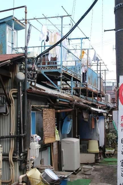 Tokyo: Shinjuku, Kawasaki, Slum & Red Light Tour with Pickup - From Tokyo pickup to Kawasaki’s lesser-known streets