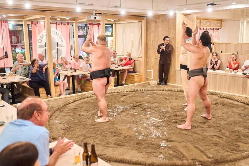 Tokyo Sumo Experience: Chanko & Mochi with a Former Pro - Pounding mochi with the wrestlers