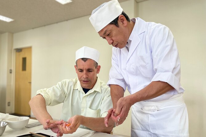 Tokyo Sushi Making Class in Tsukiji with Professional Chef - The fish-cutting demonstration and sushi basics