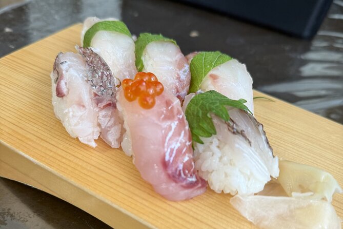 Tokyo Sushi Making Class : Sake Ceremony & Matcha Experience - Whisking matcha after the sushi