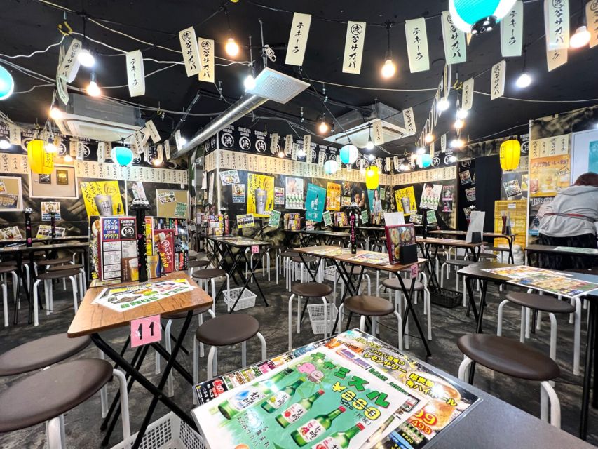 Tokyo: The Best Izakaya Tour in Shibuya - Walking through Shibuya at night