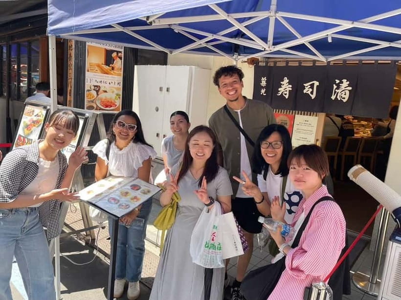 Tokyo: Tsukiji walk & sushi private tour with Uni Students - How much conversation should you expect?