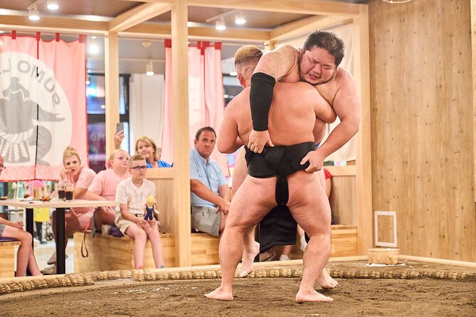 TokyoSumoShow, ChickenHotPot, and Mochi-Pounding by Pro Wrestlers - Key points at a glance