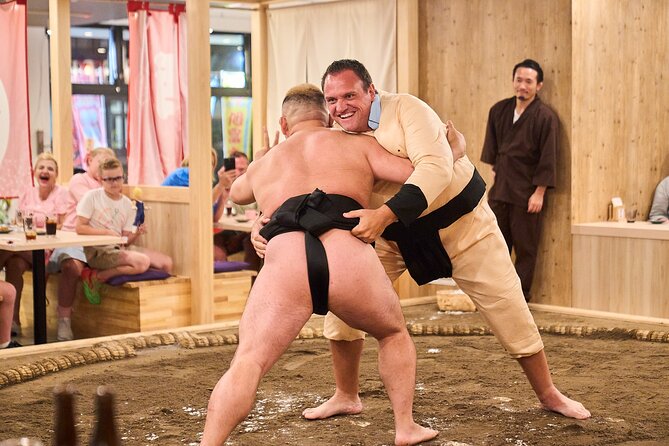 TokyoSumoShow, ChickenHotPot, and Mochi-Pounding by Pro Wrestlers - Sumo demonstrations, explanations, and short bouts